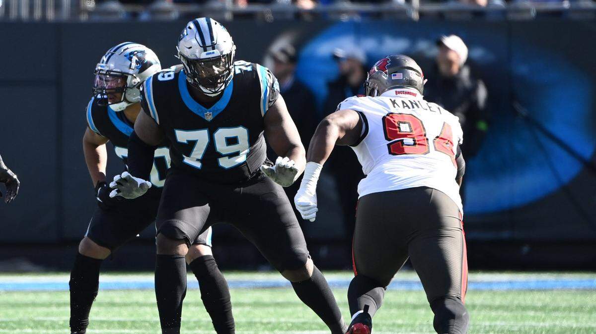 Jan 7, 2024; Charlotte, North Carolina, USA;  Carolina Panthers offensive tackle Ikem Ekwonu (79) blocks as Tampa Bay Buccaneers defensive tackle Calijah Kancey (94) rushes in the first quarter at Bank of America Stadium. Mandatory Credit: Bob Donnan-USA TODAY Sports