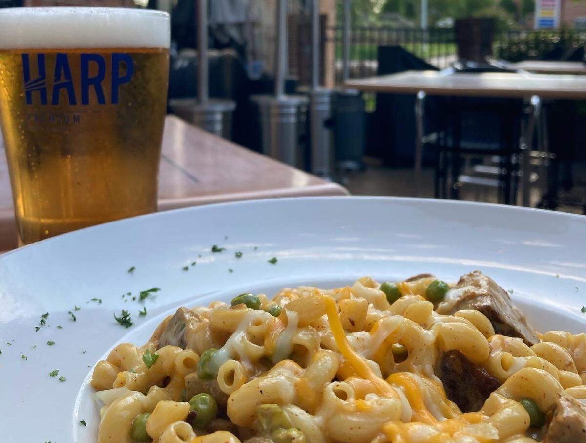 Harp & Crown’s Brisket Mac n Cheese includes Guinness-braised brisket, homemade BBQ sauce and English peas ($16.50).