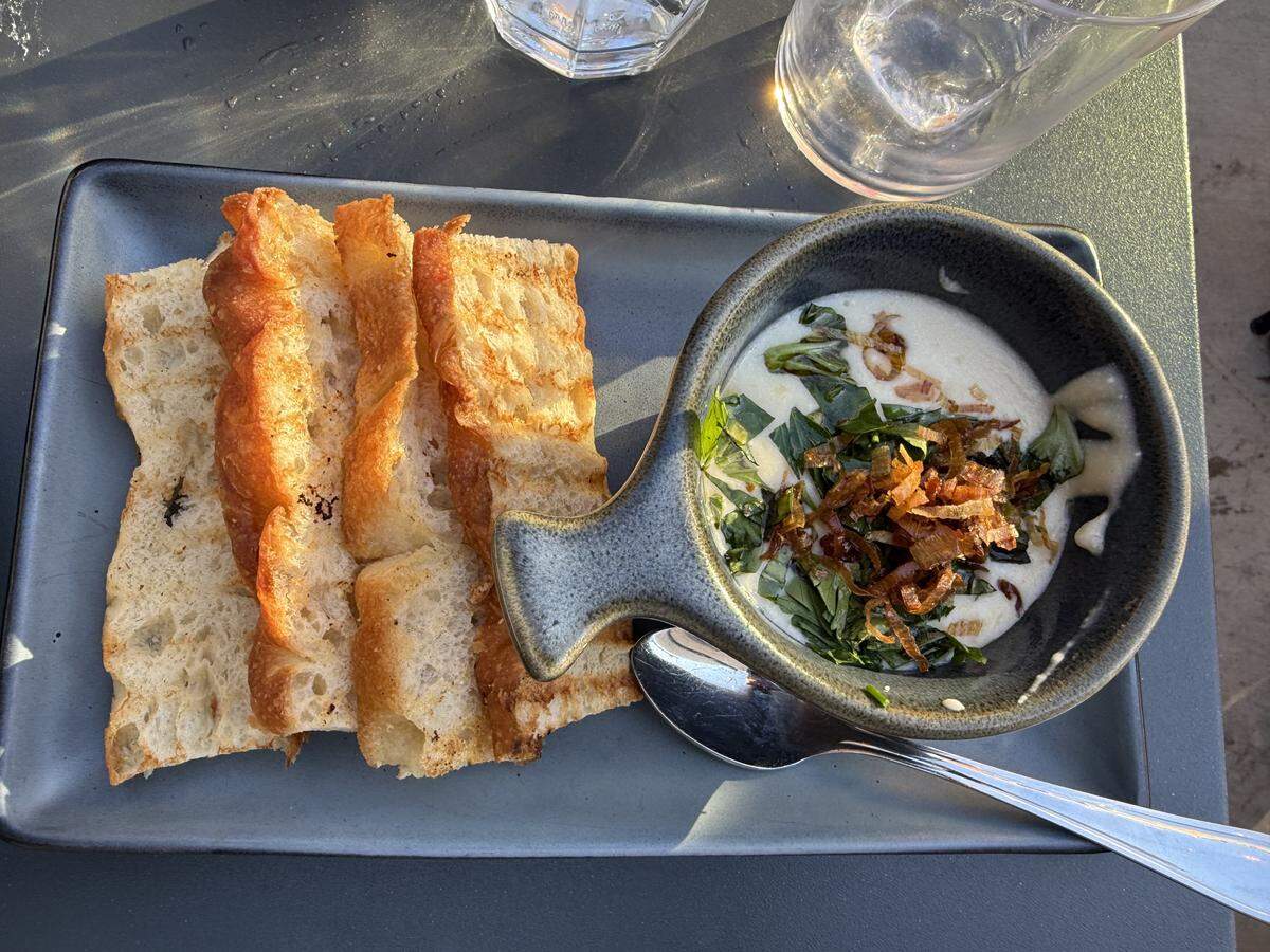 Postino’s roasted mushroom fondue includes melted white cheddar, truffle and roasted crimini mushrooms and is served with focaccia crostini.
