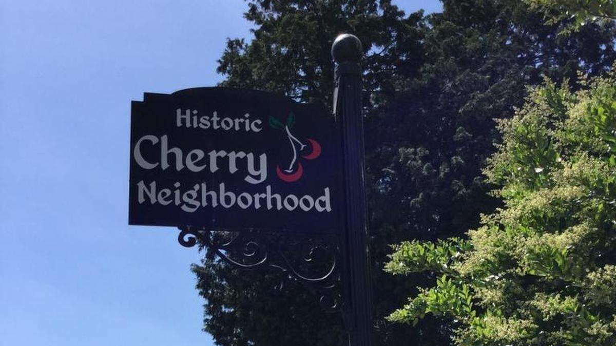 Photo of Historic Cherry neighborhood sign in Charlotte. The neighborhood community organization has been in a years-long legal fight after a disputed development deal with them without control over land they owned and without promised affordable housing units.