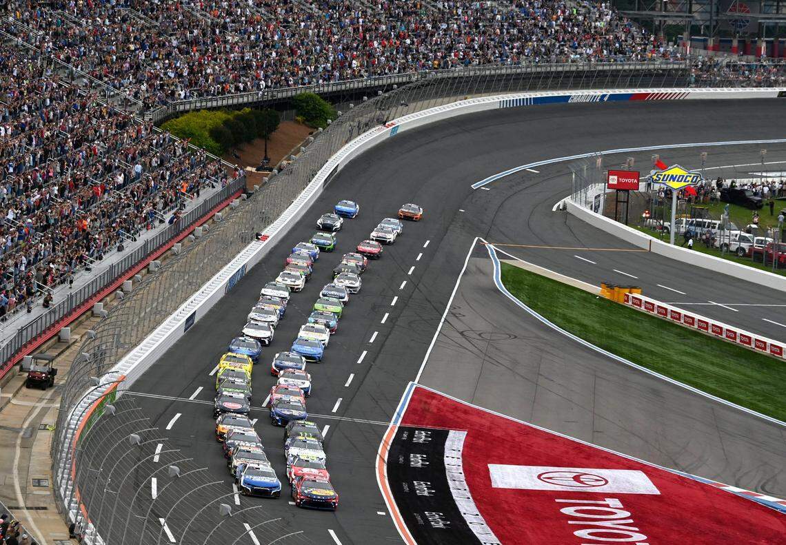 The NASCAR Cup Series field head to the start/finish line during the running of the Coca-Cola 600 on May 25, 2025, at Charlotte Motor Speedway.
