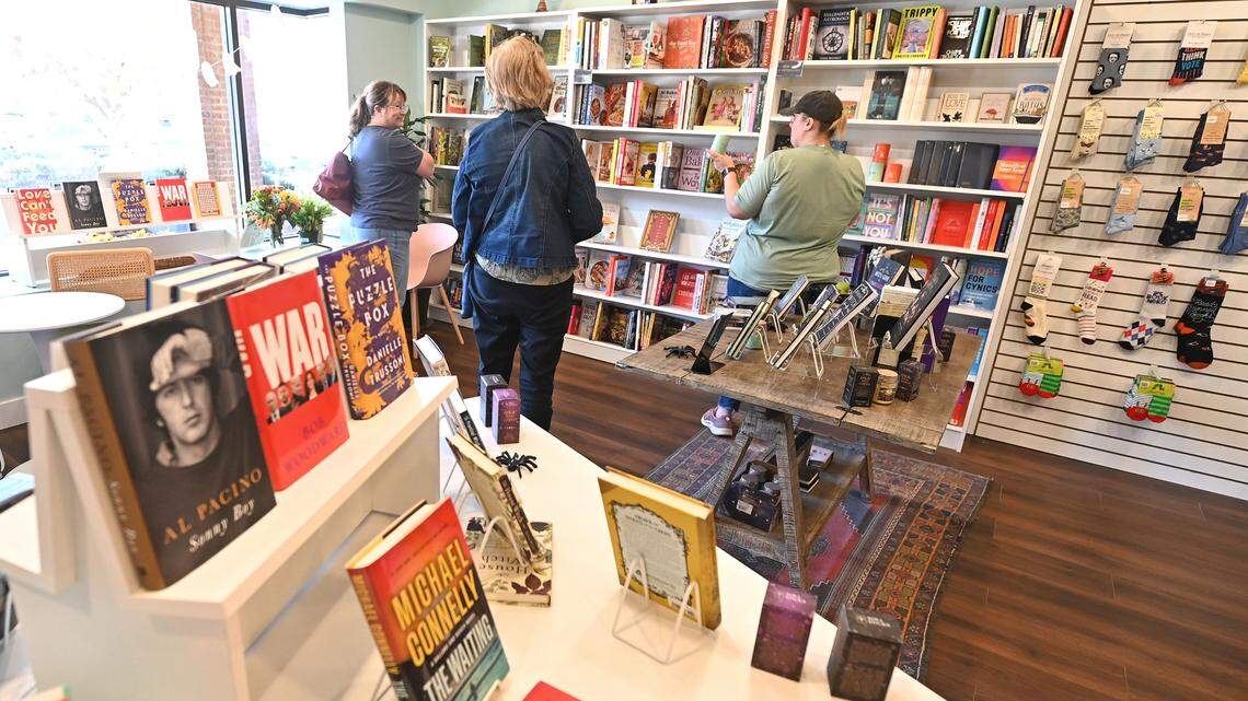 Shoppers mingle in a corner at Troubadour Booksellers on Thursday, October 24, 2024.