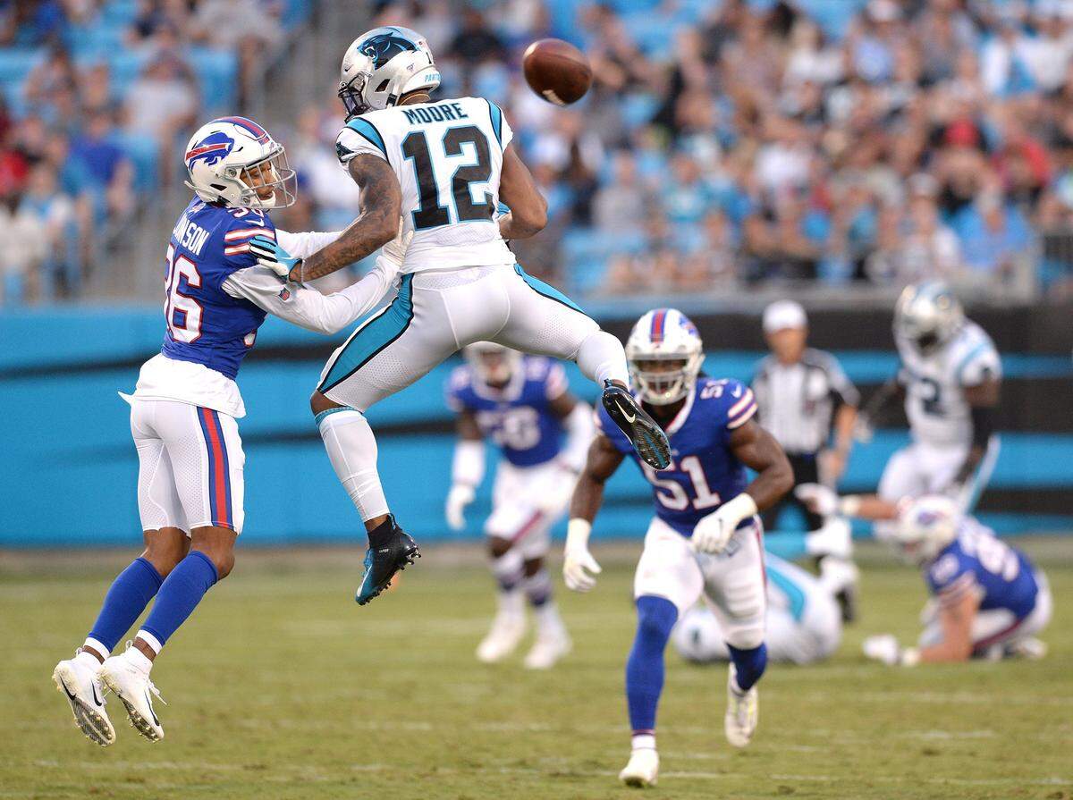 Carolina Panthers wide receiver DJ Moore (12) leaps for a ball that sailed too far Friday night. Both Kyle Allen and Will Grier had accuracy problems in the game. No.1 quarterback Cam Newton didn’t play as an injury precaution.