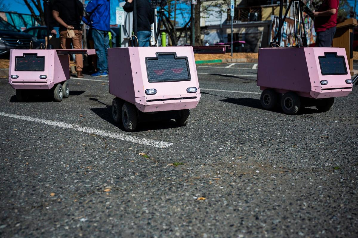 Tiny Mile’s pink robots that deliver coffee were unveiled in Plaza Midwood on Friday, April 1, 2022 in Charlotte.