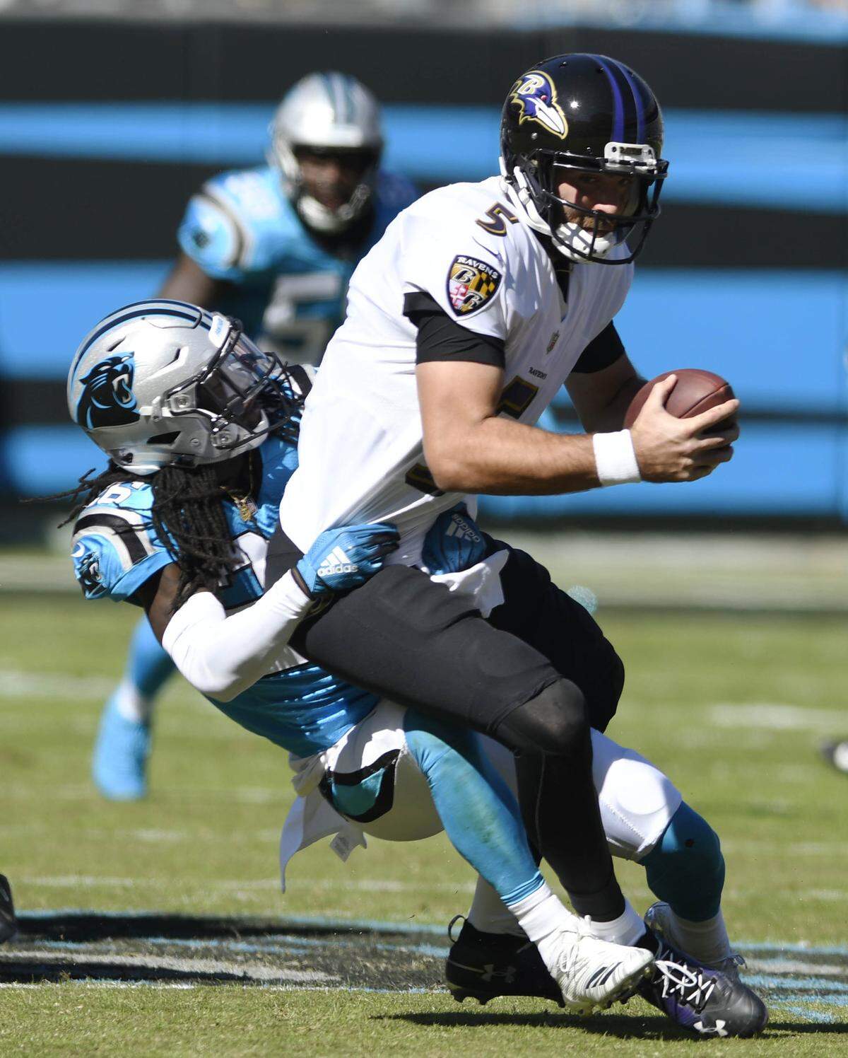 Carolina Panthers cornerback Donte Jackson (26) recorded his first career sack Sunday against the Baltimore Ravens. (David T. Foster III/Charlotte Observer/TNS)