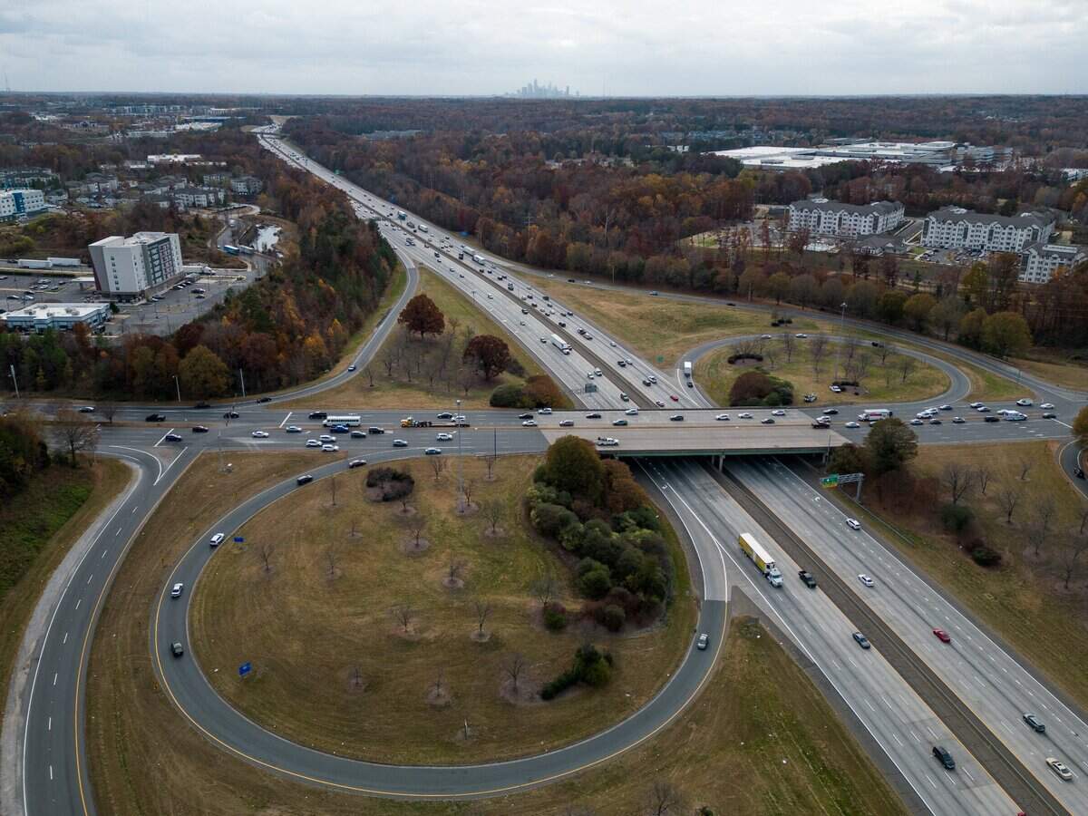Traffic moves through the bridge over Interstate 85 via W.T. Harris Boulevard.