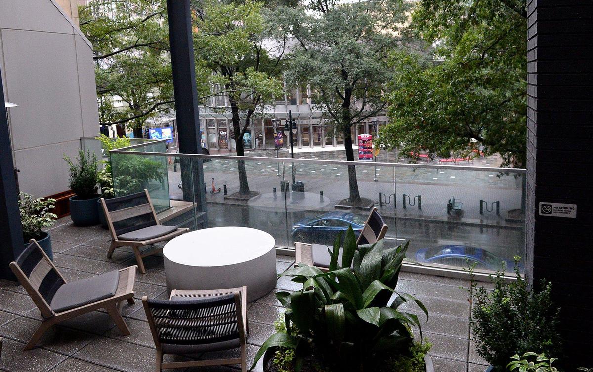 The Aster bar in One Independence Center has a view across Tryon Street to the Blumenthal. It's one of several new spaces that activate the building for employees and passersby. 