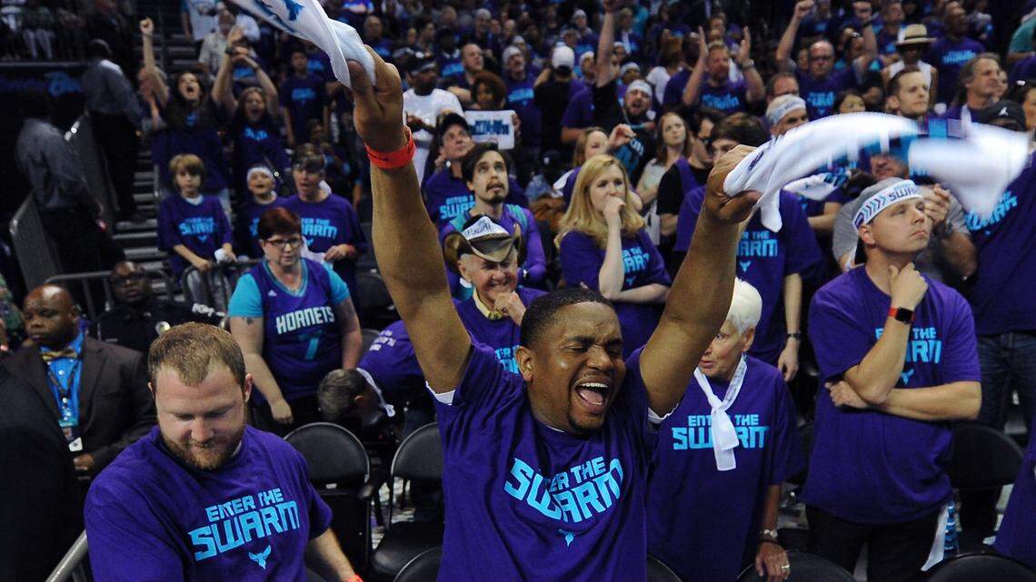 Fans are torn between cheering or looking concerned as the Charlotte Hornets try to come back against the Miami Heat during late fourth quarter action at Time Warner Cable Arena on Friday, April 29, 2016 in Charlotte, NC. The Charlotte Hornets hosted the Miami Heat in Game 6 of the First Round of the NBA Playoffs. The Hornets lost to the Heat 97-90.