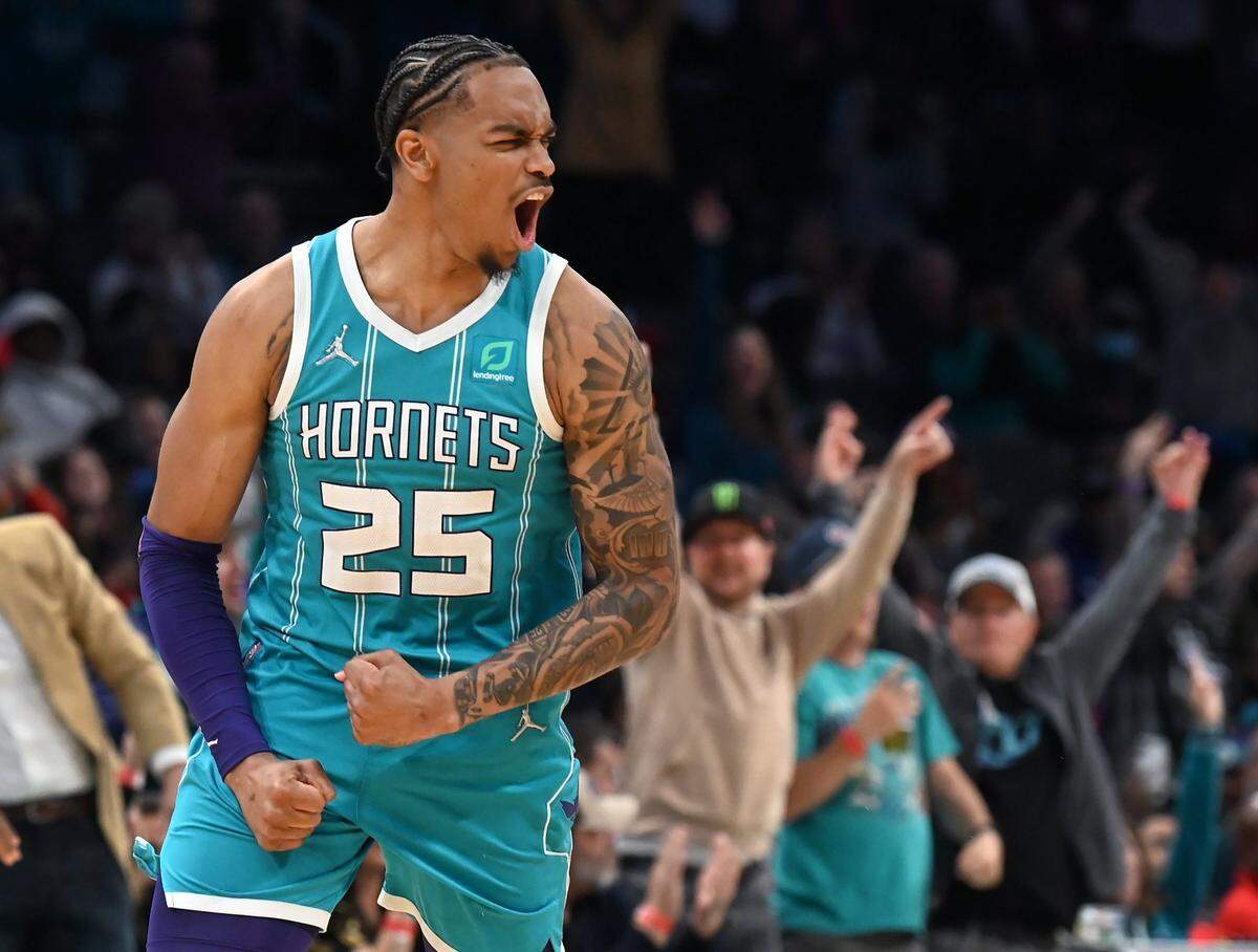 Charlotte Hornets forward PJ Washington celebrates one of his baskets against the Atlanta Hawks during second half action at Spectrum Center in Charlotte, NC on Wednesday, March 16, 2022. The Hornets defeated the Hawks 116-106.