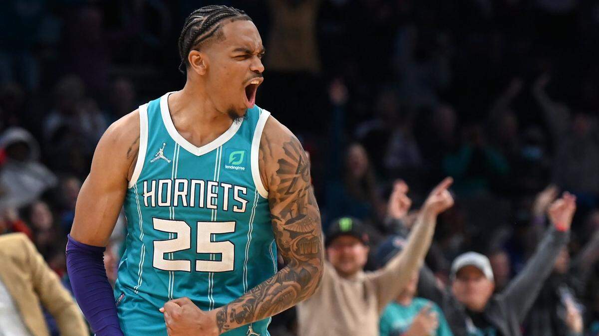 Charlotte Hornets forward PJ Washington celebrates one of his baskets against the Atlanta Hawks during second half action at Spectrum Center in Charlotte, NC on Wednesday, March 16, 2022. The Hornets defeated the Hawks 116-106.