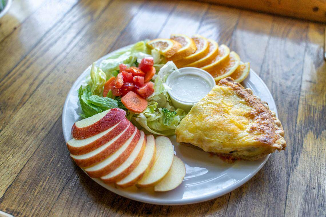Lupie’s Cafe’s daily quiche comes with fruit and a side salad.