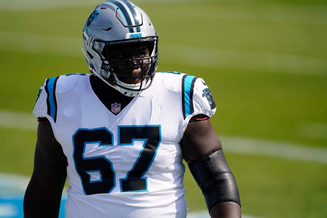Carolina Panthers offensive guard John Miller (67) warms up before the start of an NFL football game against the Arizona Cardinals Sunday, Oct. 4, 2020, in Charlotte, N.C. (AP Photo/Brian Blanco)