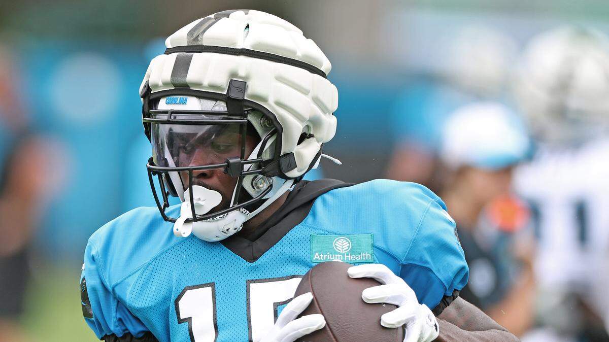 Carolina Panthers wide receiver Jonathan Mingo secures the ball on a pass reception during practice on Tuesday, August 6, 2024.