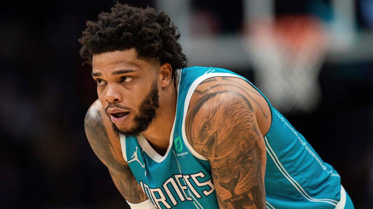 Charlotte Hornets forward Miles Bridges (0) looks on during the second half of an NBA basketball game against the Los Angeles Lakers in Charlotte, N.C., Friday, Jan. 28, 2022. (AP Photo/Jacob Kupferman)