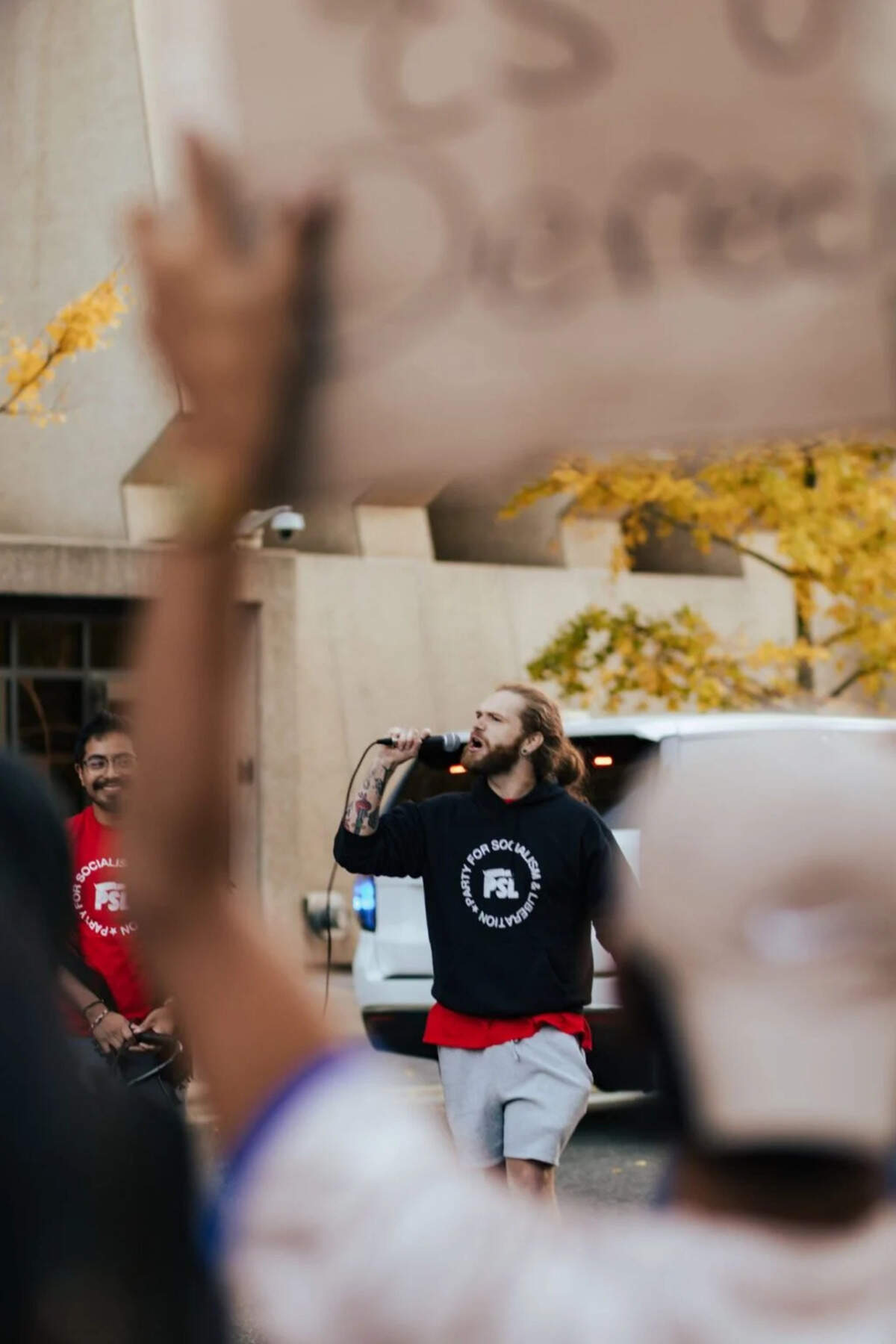 Thomas Crowe-Allbritton helps lead a protest Nov. 16 in Charlotte against immigration enforcement operations.