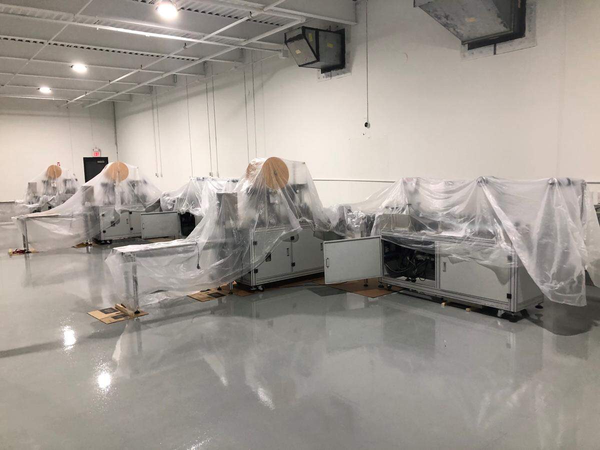 The mask facility in Pineville that STRONG Manufacturers operates. The company is ready to produce nine million masks per month, but the machines are sitting idle because it needs more raw materials.