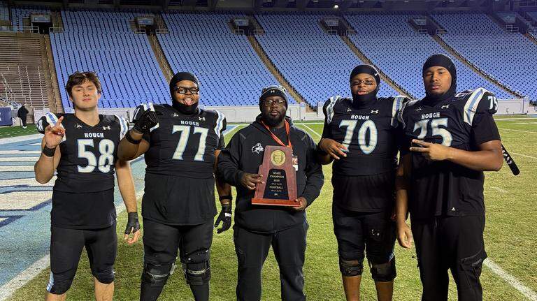 Hough High rallies around football coach after cardiac arrest leaves him in ICU