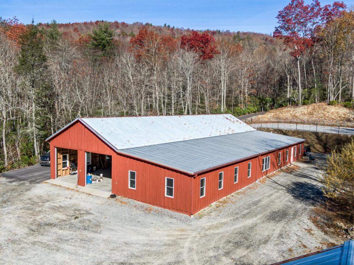 The Ridges of Steel Creek estate includes a horse barn, sheds and a 5,500-square-foot workshop with a kitchen, bathroom and laundry area.