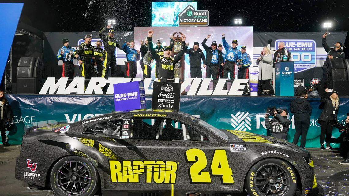 William Byron (24) celebrates after winning the NASCAR Cup Series auto race at Martinsville Speedway on Saturday, April 9, 2022, in Martinsville, Va. (AP Photo/Steve Helber)