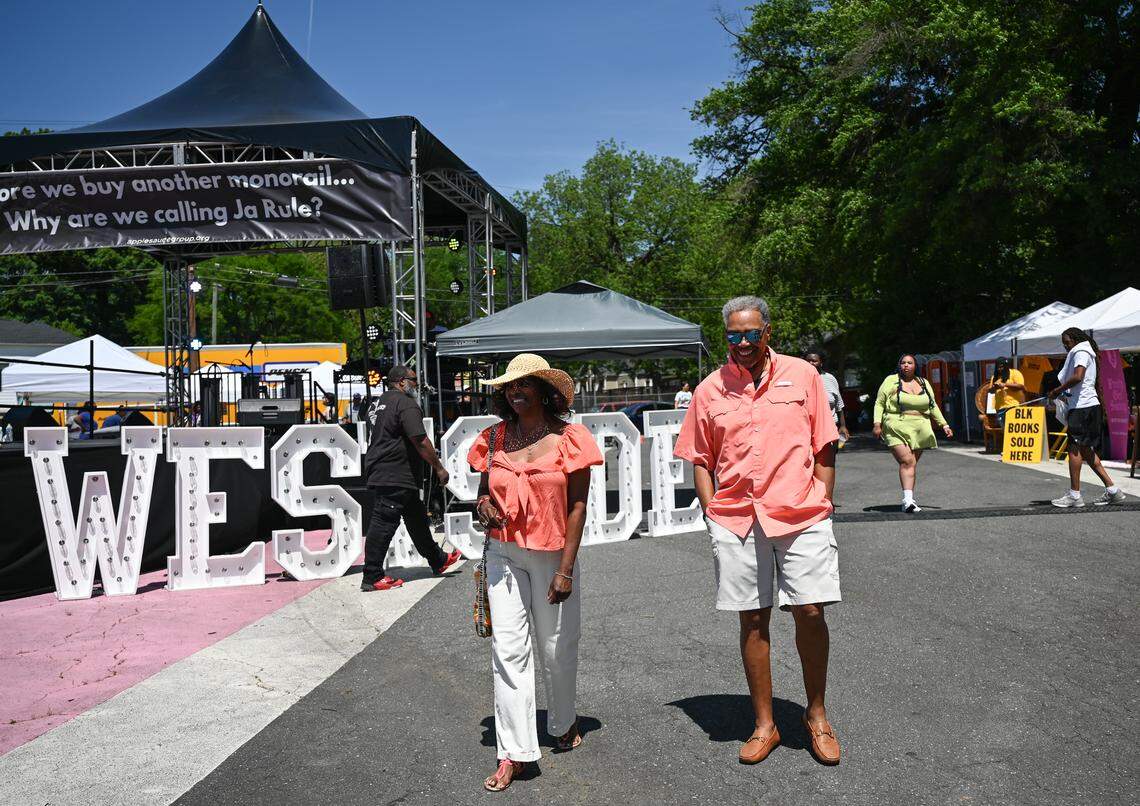 Deloris and Richard Horton arrive in matching outfits to the West Side Fish Fry at West Complex in Charlotte on Saturday, April 18, 2026.