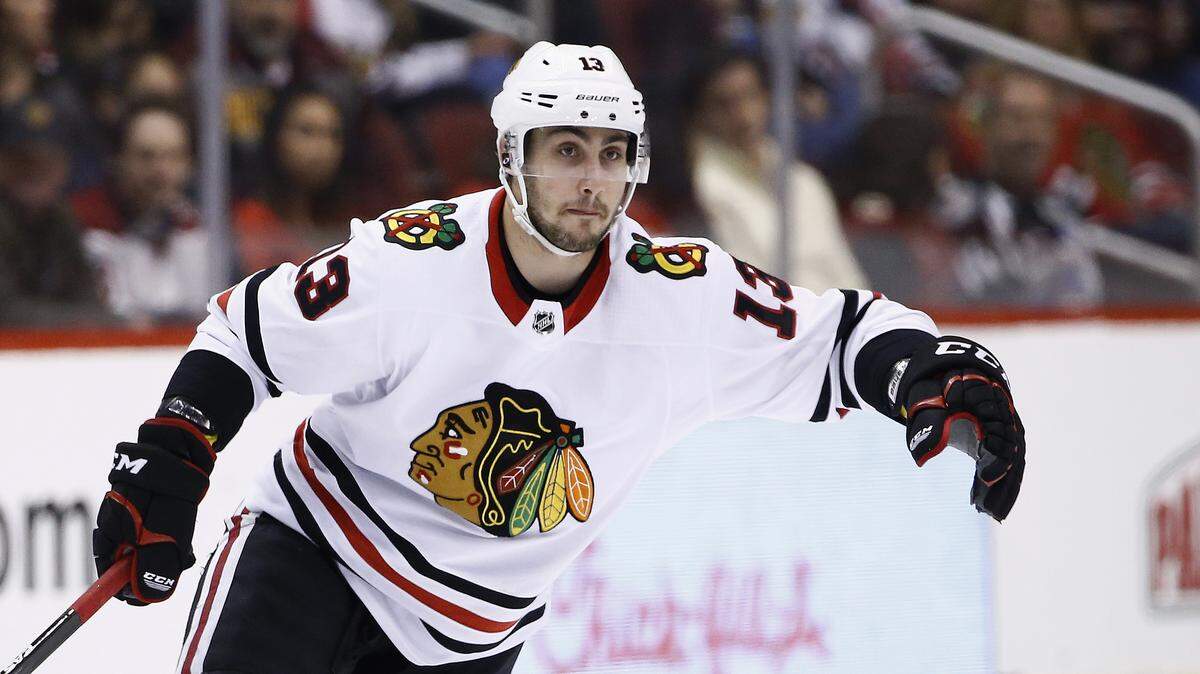 Chicago Blackhawks left wing Tomas Jurco (13) skates to the puck during the first period of an NHL hockey game against the Arizona Coyotes Tuesday, Feb. 13, 2018, in Glendale, Ariz. The Coyotes defeated the Blackhawks 6-1. (AP Photo/Ross D. Franklin)