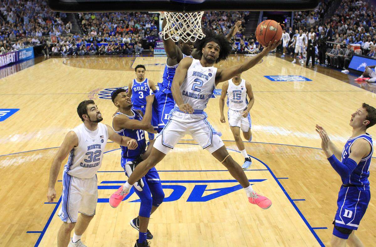 March 15, 2019: North Carolina's Coby White (2) shoots in the first half of Duke's 74-73 victory over UNC in the semifinals of the 2019 ACC Tournament in Charlotte.