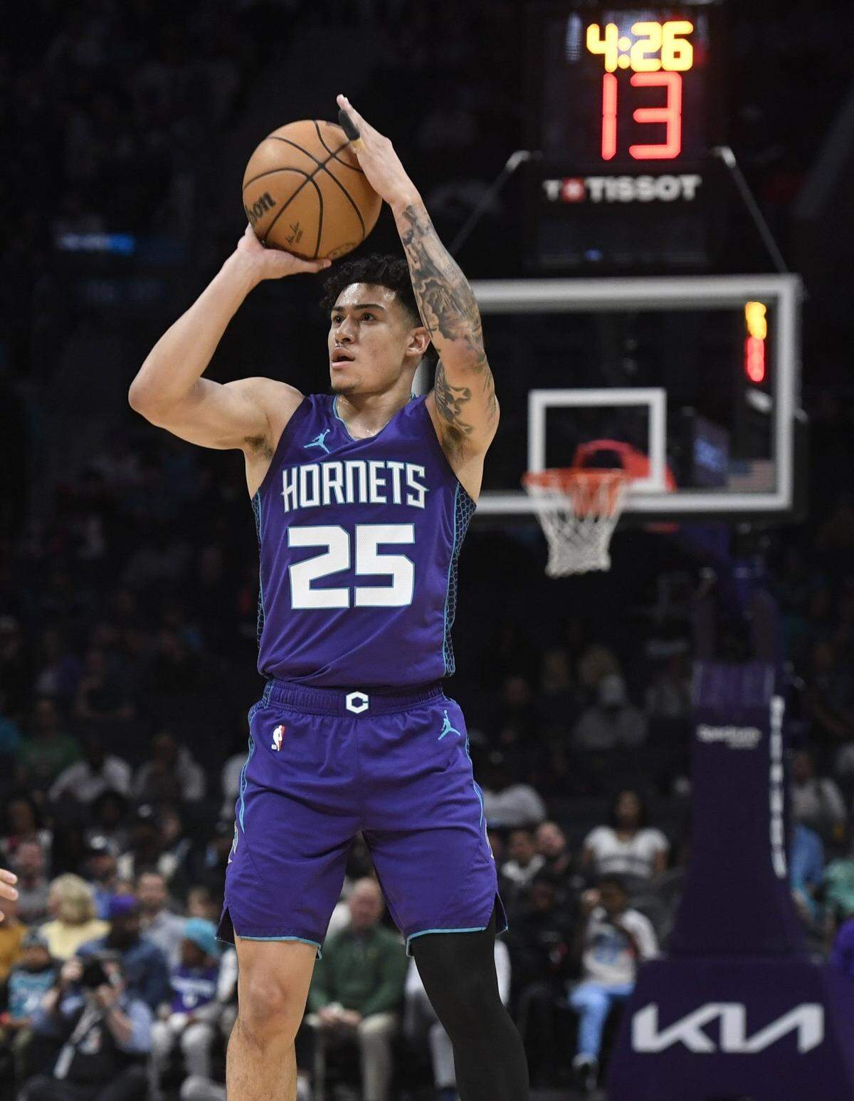 Charlotte Hornets guard KJ Simpson (25) shoots during the first half against the Memphis Grizzlies at the Spectrum Center.