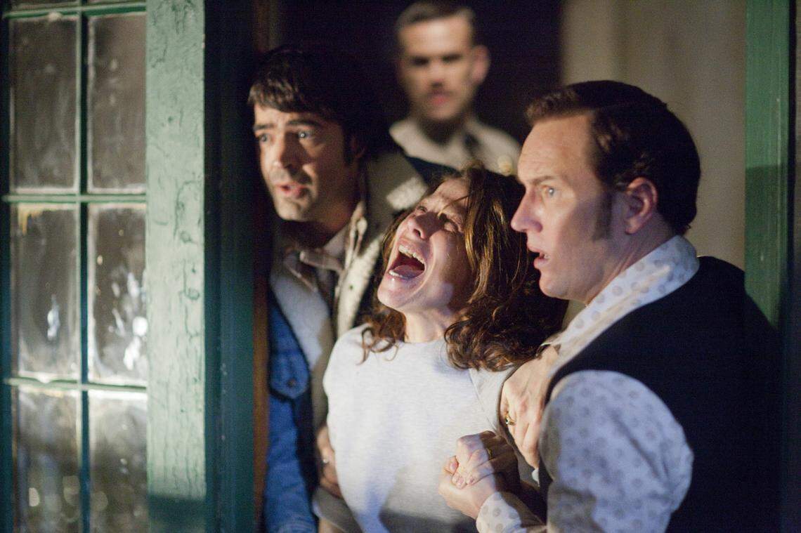 From left, Ron Livingston, Lili Taylor and Patrick Wilson share a moment in “The Conjuring,” a 2013 horror film shot in part in Currie and Wilmington.