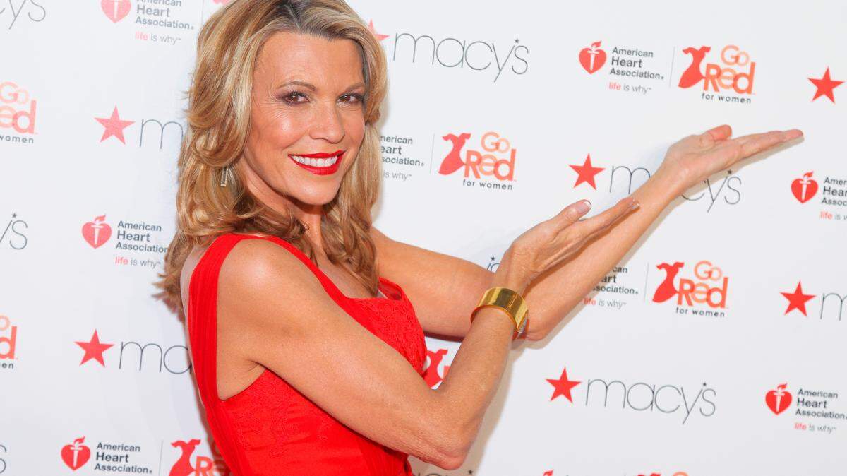 In this AP file photo, Vanna White is shown at the Macy’s Red Dress Event in New York on Thursday, Feb. 11, 2016. The ‘Wheel of Fortune’ co-host will greet fans in the Fan Zone at Charlotte Motor Speedway on Friday, May 17.