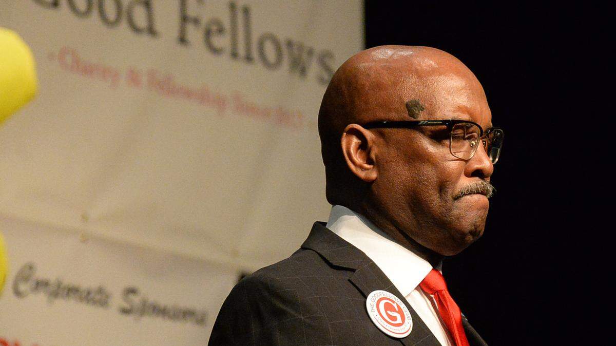 Bishop George E. Battle Jr. gives the invocation at the Good Fellows annual holiday luncheon in 2015 at the Charlotte Convention Center.