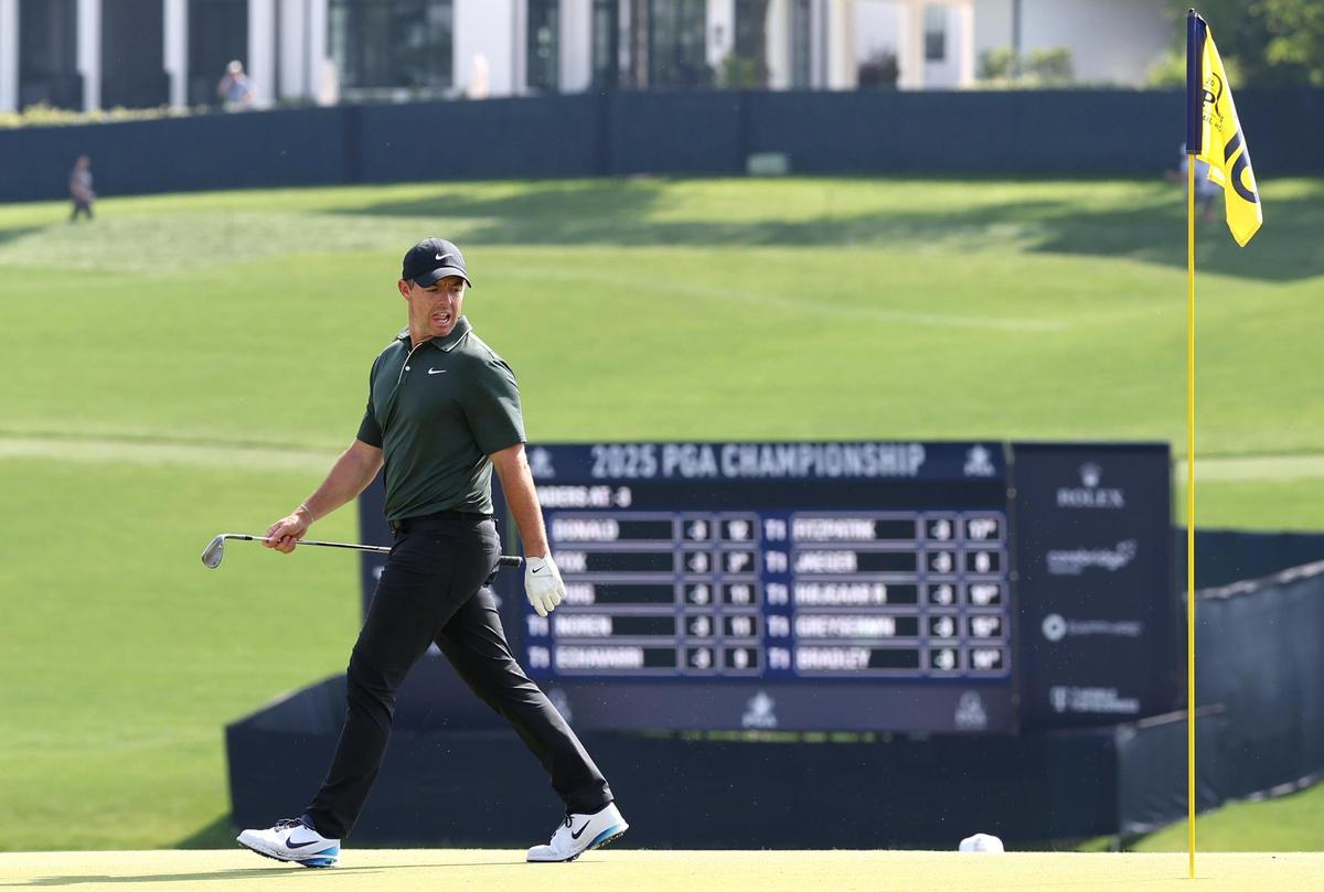 Rory McIlroy glances back at the pin prior to hitting a shot from the rough during the opening round of the 107th PGA Championship at Quail Hollow Club in Charlotte, NC on Thursday, May 15, 2025.
