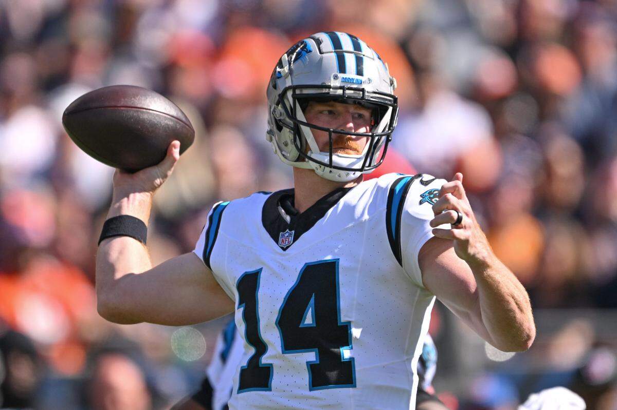 Carolina Panthers quarterback Andy Dalton (14) passes the ball against the Chicago Bears during Sunday’s second quarter at Soldier Field. Daniel Bartel-Imagn Images