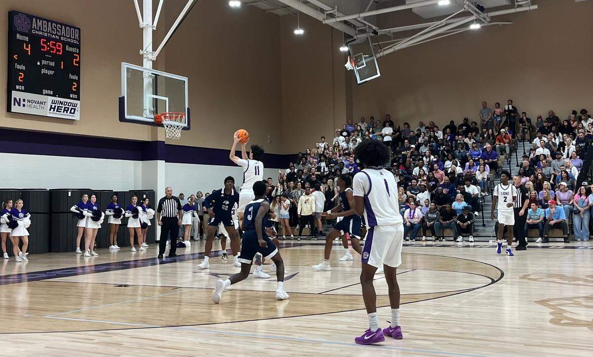 Dylan Deluca takes a shot for Ambassador Christian School, the new high school in Huntersville, during its first basketball game on Thursday, Nov. 7, 2024.