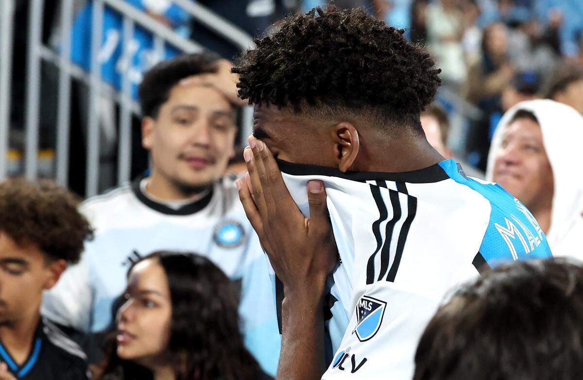 Charlotte FC center back Adilson Malanda walks off the pitch at Bank of America Stadium after the team’s elimination from the playoffs. 