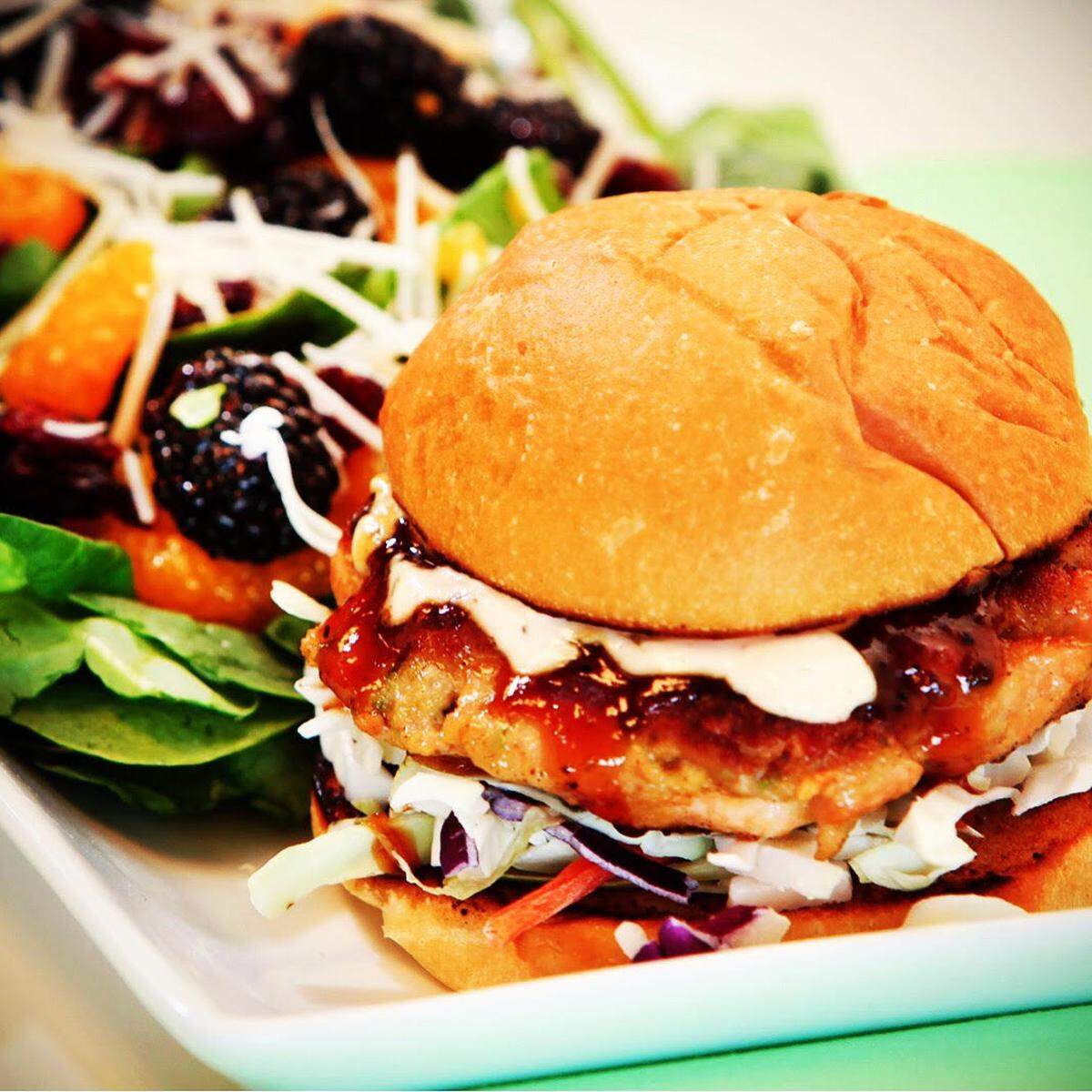 On the menu at Brown Bag: A salmon burger with diced jalapeno and slaw. It's $9.95 with two sides.