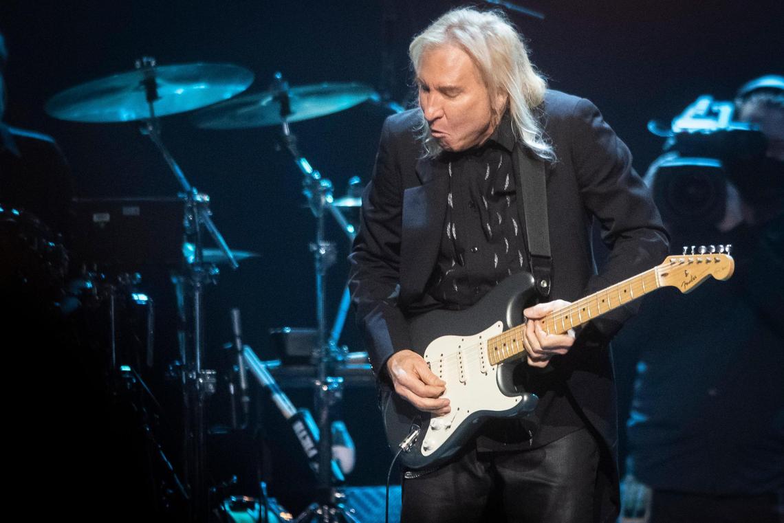 The Eagles’ Joe Walsh performs “New Kid in Town” during the Hotel California tour at the Spectrum Center in Charlotte, N.C., Monday, Feb. 21, 2022.