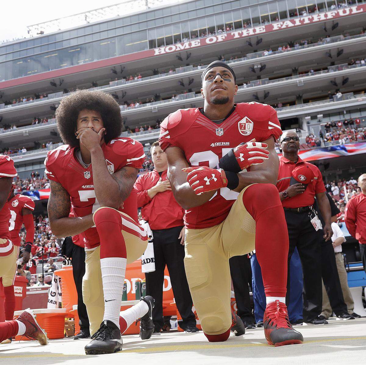 Carolina Panthers wide receiver Torrey Smith says it’s difficult for him to see former San Francisco 49ers quarterback Colin Kaepernick (left)  and safety Eric Reid painted as villains.