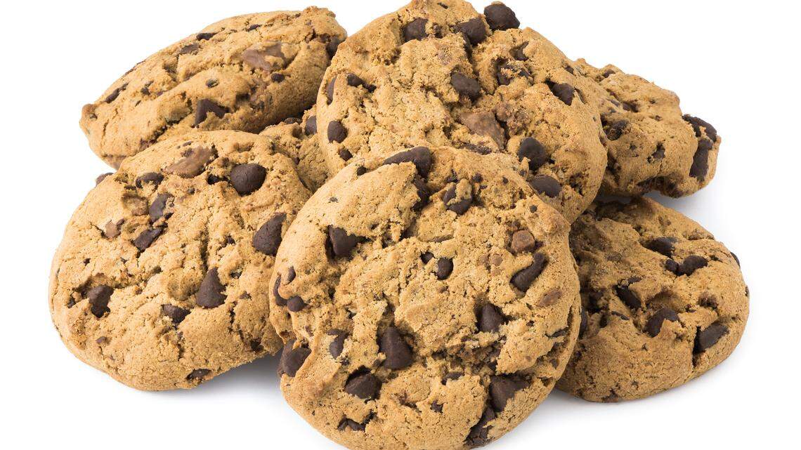 Pile of Chocolate Chip Cookies Isolated on White Background