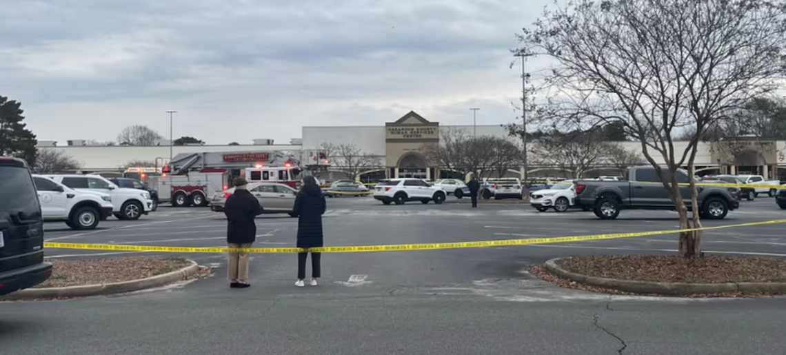 Police tape blocks the parking lot of the Cabarrus Department of Social Services building in Kannapolis NC after two people were fatally shot on Wednesday, Feb. 19, 2025. The gunman died of a self-inflicted gunshot wound after a 20-mile police pursuit.