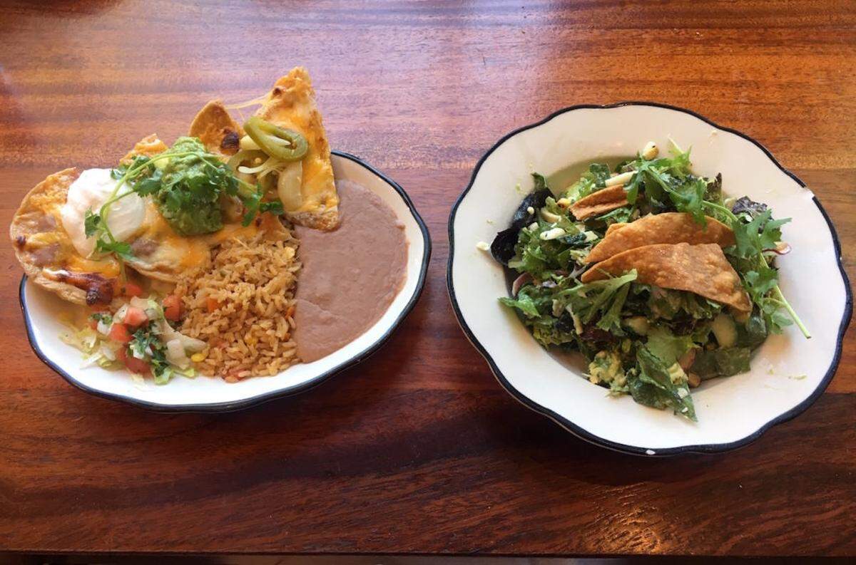 At Superica, diners can mix and match items, such as this nachos and salad combination.