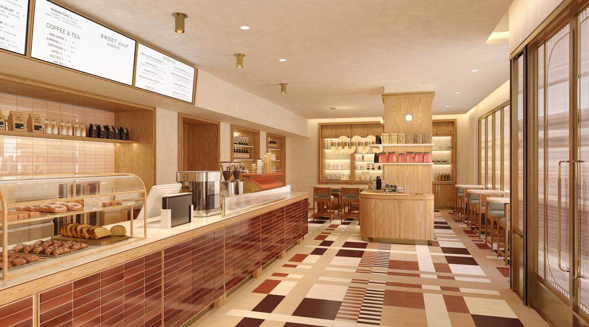 An architectural rendering of a bright, modern cafe with a warm mid-century aesthetic. On the left, a long ordering counter features a glossy, reddish-brown stacked-tile facade and a white countertop showcasing a glass pastry display and a metallic espresso machine. The flooring is composed of a playful checkered pattern of matte tiles in shades of cream, tan, and dark brown. Light oak wood paneling wraps the pillars and back retail shelves, while small bistro tables and tall wooden stools line the window wall on the right.