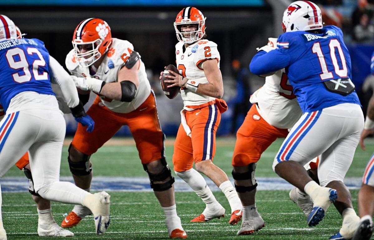 Clemson Tigers quarterback Cade Klubnik (2) drops to throw during the second quarter against the Southern Methodist Mustangs in Saturday’s 2024 ACC Championship game at Bank of America Stadium. Bob Donnan-Imagn Images