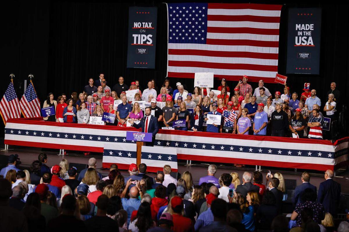 Senator JD Vance, the GOP vice presidential candidate, speaks to supporters during a rally at Dale F. Halton Theater on the campus of CPCC in Charlotte, NC on Monday, September 23, 2024.