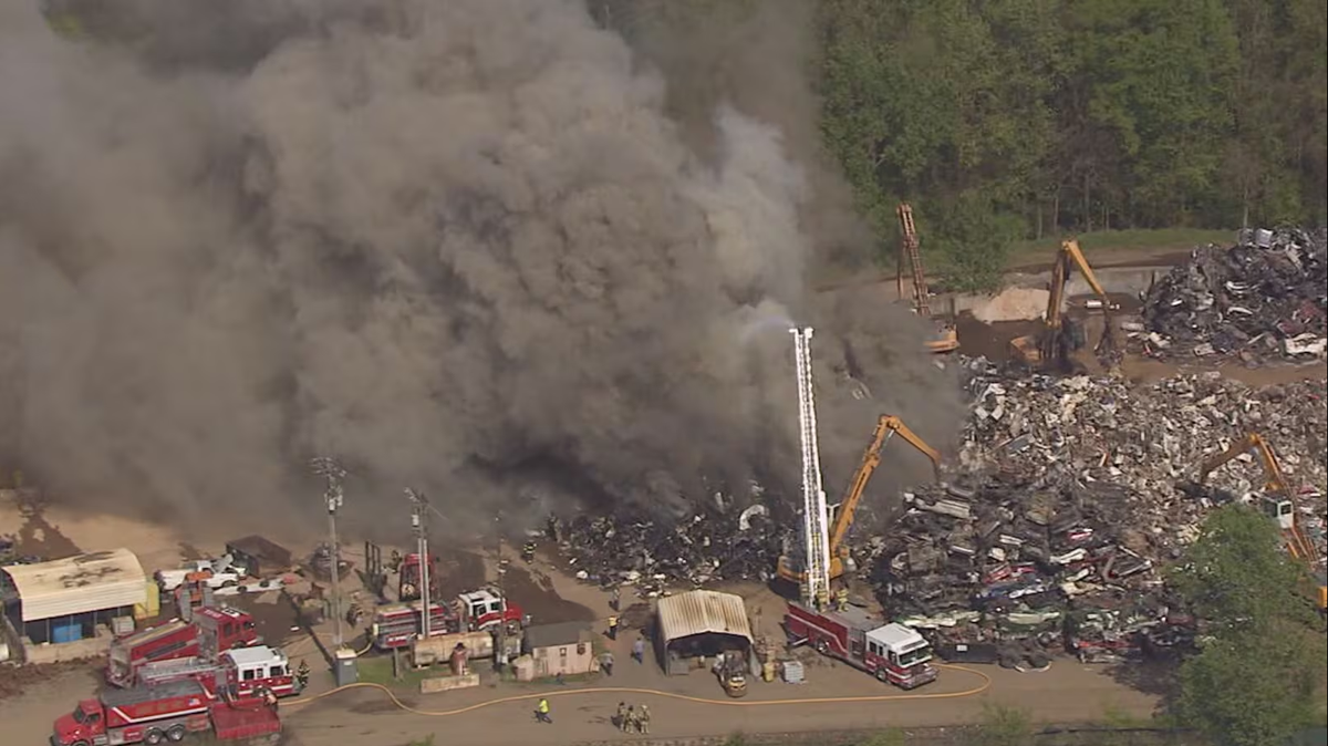 A scrapyard fire in Gaston County Monday spread a plastic burning smell to other parts of the Charlotte region.