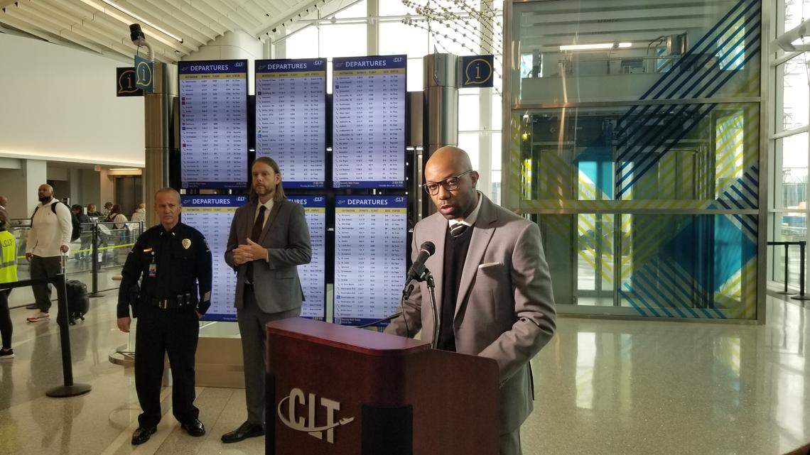 Jerome Woodard, chief operating officer for Charlotte Douglas International Airport, speaks to the media about traveling for the Thanksgiving holiday.