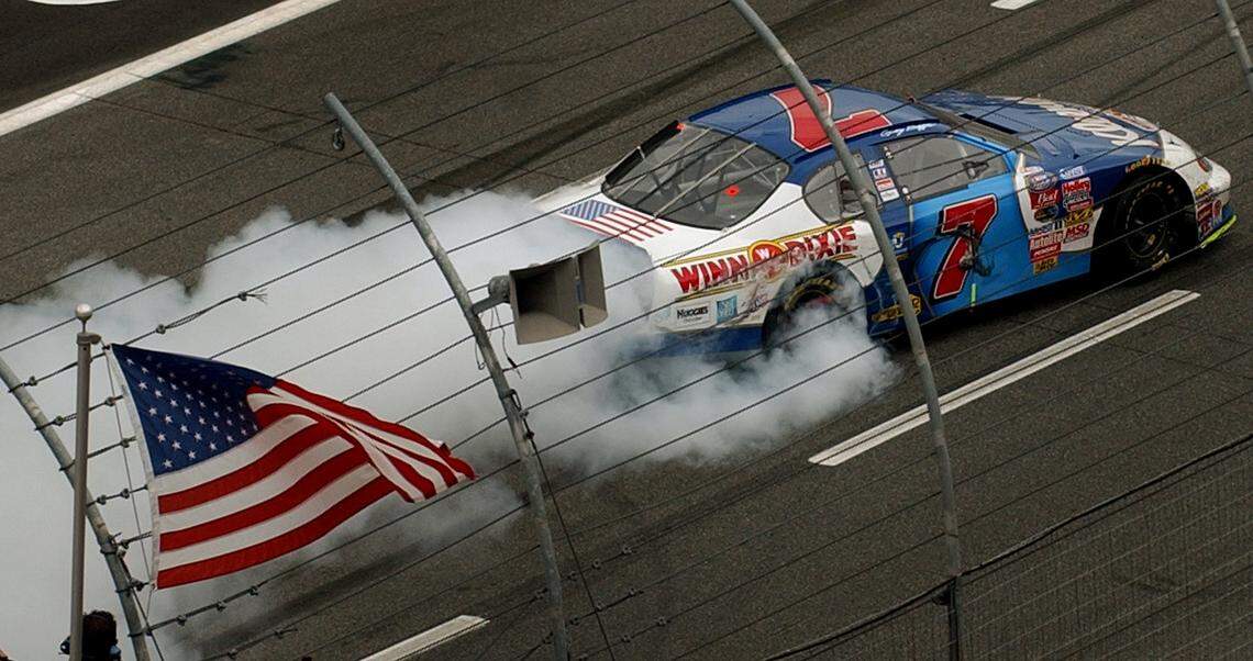 Busch Series driver Greg Biffle celebrates his victory in the Little Trees 300 at Lowe's Motor Speedway in Oct. 2003 by doing a burnout down the frontstretch. Biffle won the race with Michael Waltrip finishing second.