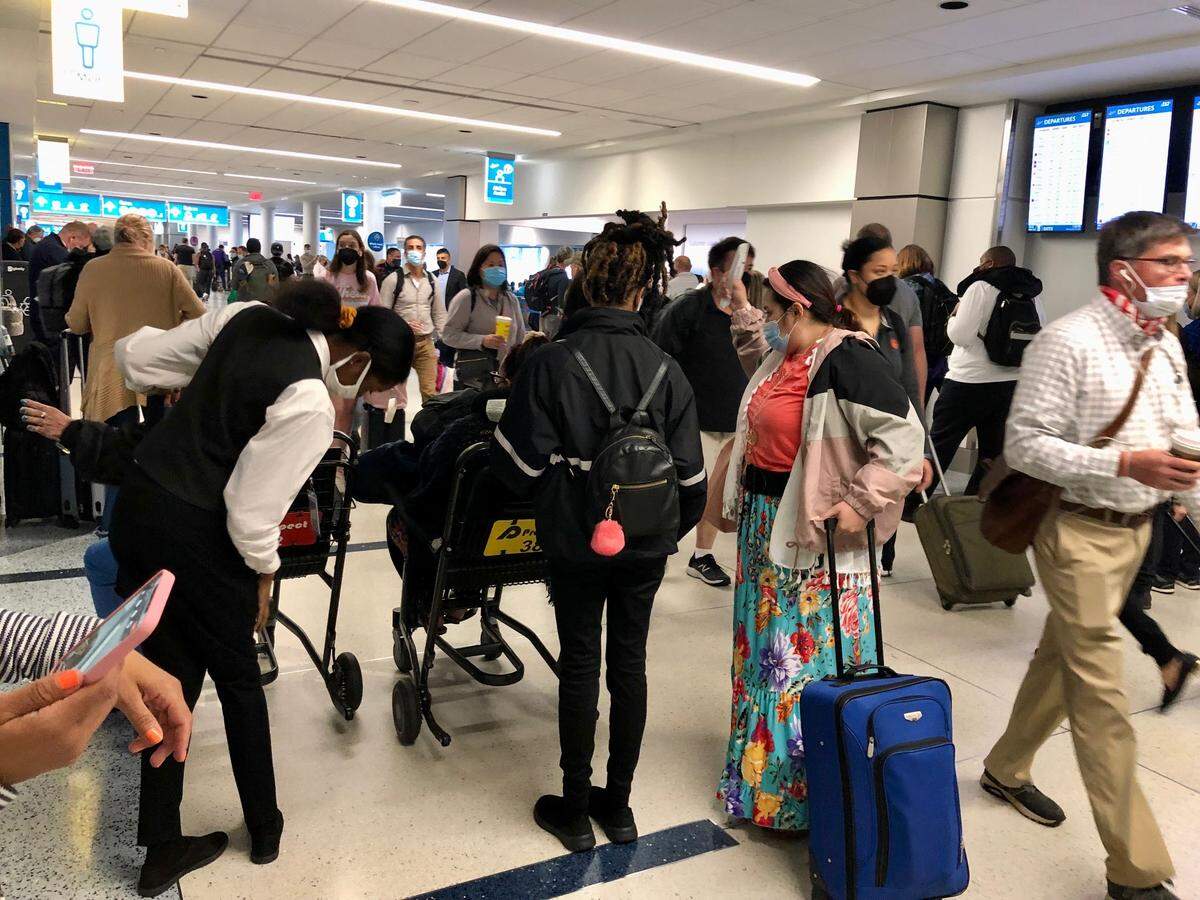 Most passengers in Charlotte Douglas International Airport were still wearing masks Monday night around 7:45 p.m., despite a judge’s ruling earlier in the day that struck down the federal mask requirement for public transportation.
