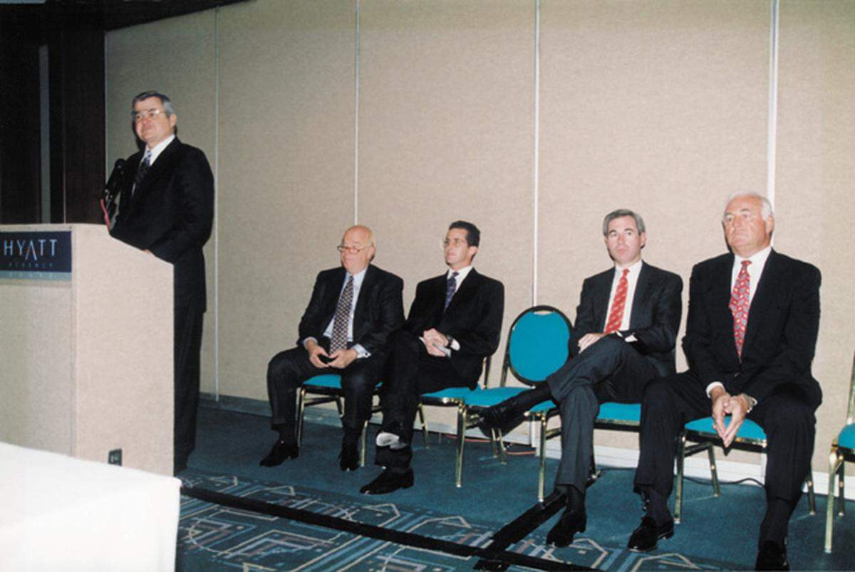 In October 1993, Jerry Richardson (at podium) and other executives successfully convinced the NFL owners to award Charlotte an NFL franchise. Max Muhleman (far left, seated) is next to Mark Richardson, Jerry’s son, who was also instrumental in the NFL expansion effort.