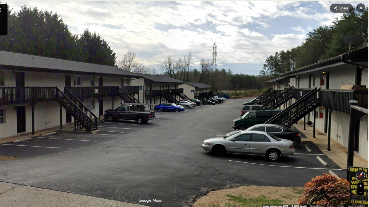 A robbery turned deadly when shots were fired through an apartment door, killing the tenant inside, Winston-Salem police say.