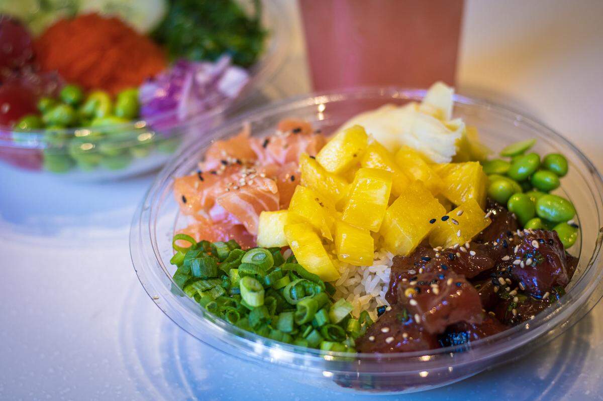 Koibito Poké, a fast-casual restaurant that features build-your-own Hawaiian poké bowls, will open in Charlotte in July 2022.